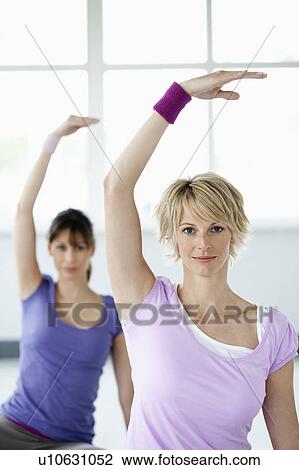 Women stretching View Large Photo Image Stock Image - Women stretching. Fotosearch