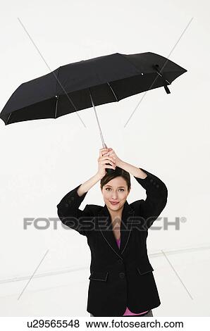 Women under umbrella View Large Photo Image Stock Photo - Women under umbrella. Fotosearch