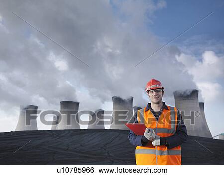 Worker At Coal Fired Power Station View Large Photo Image Stock Photograph - Worker At Coal Fired Power Station. Fotosearch