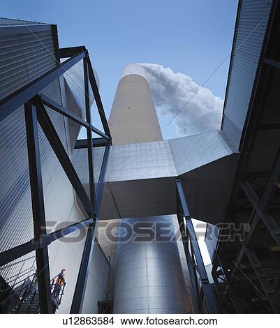 Worker & Desulphurisation Plant View Large Photo Image Picture - Worker & Desulphurisation Plant. Fotosearch