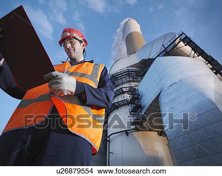 Worker & Desulphurisation Plant View Large Photo Image Picture - Worker & Desulphurisation Plant. Fotosearch