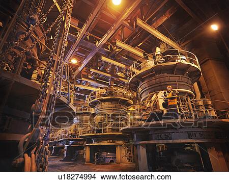Picture - Worker Milling Coal In Power Station. Fotosearch