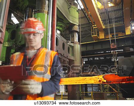 Picture - Worker With Steel Forge. Fotosearch