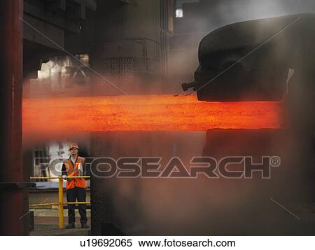 Stock Photography - Worker With Steel Forge. Fotosearch