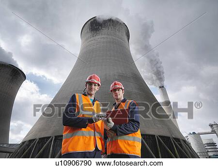 Stock Image - Workers At Coal Fired Power Station. Fotosearch