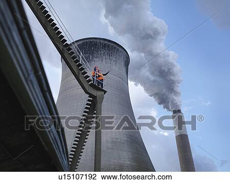 Stock Image - Workers At Coal Fired Power Station. Fotosearch