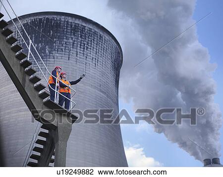 Stock Image - Workers At Coal Fired Power Station. Fotosearch