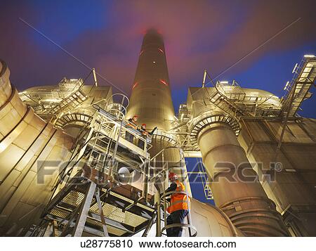 Stock Image - Workers At Coal Fired Power Station. Fotosearch