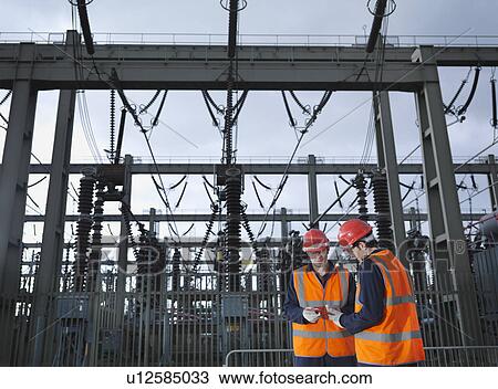 Workers At Electrical Switching Station View Large Photo Image Stock Image - Workers At Electrical Switching Station. Fotosearch