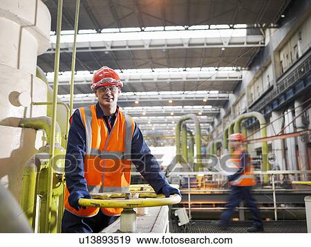 Workers In Coal Fired Power Station View Large Photo Image Stock Photo - Workers In Coal Fired Power Station. Fotosearch