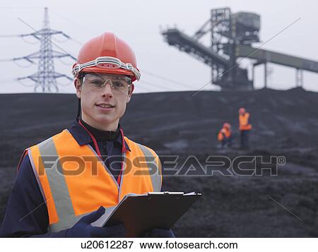 Workers In Coal Store In Power Station View Large Photo Image Stock Photo - Workers In Coal Store In Power Station. Fotosearch