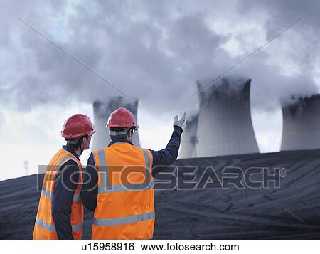 Stock Photograph - Workers Inspecting Coal Store. Fotosearch