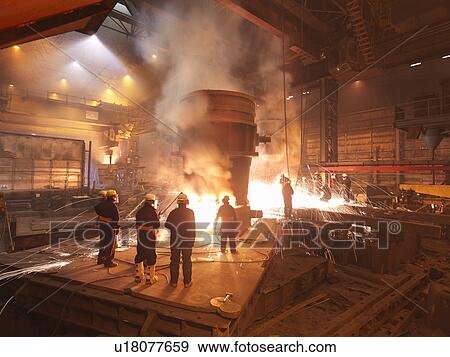 Stock Photo - Workers With Molten Steel In Plant. Fotosearch