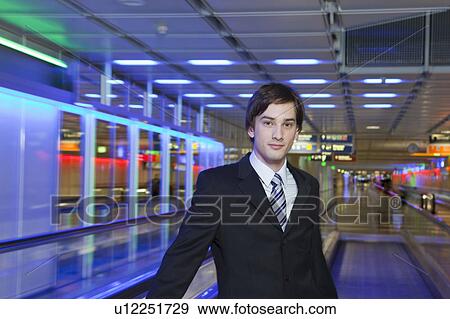 young businessman at airport View Large Photo Image Stock Photo - young businessman at airport. Fotosearch