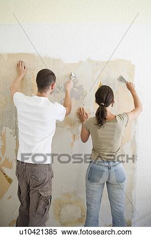 Young couple renovating View Large Photo Image Stock Photography - Young couple renovating. Fotosearch