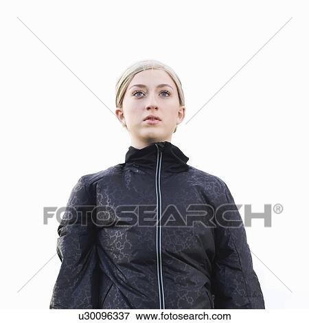 Young woman looking ahead focussed View Large Photo Image Stock Photo - Young woman looking ahead focussed . Fotosearch