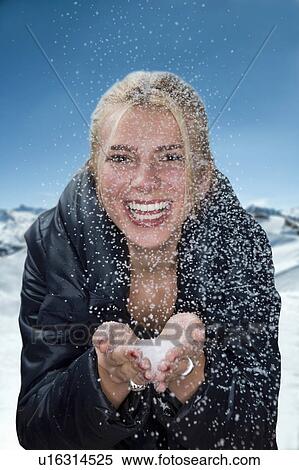 Young woman with snow flakes View Large Photo Image Stock Photography - Young woman with snow flakes. Fotosearch
