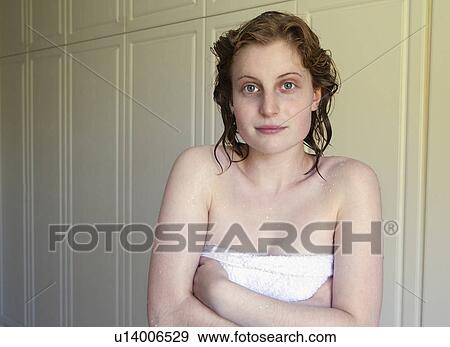 Young woman wrapped in towel View Large Photo Image Stock Photo - Young woman wrapped in towel. Fotosearch