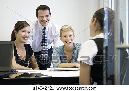 A business meeting View Large Photo Image Stock Photography - A business meeting. Fotosearch