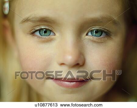 A close up portrait of a girls face View Large Photo Image Stock Image - A close up portrait of a girls face. Fotosearch