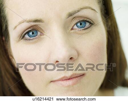 Stock Image - A close up portrait of a woman. Fotosearch