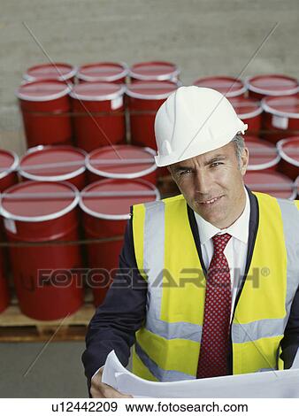 A construction site manager View Large Photo Image Stock Photo - A construction site manager. Fotosearch