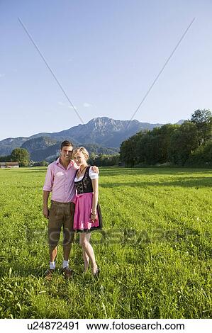 A couple wearing a traditional outfit View Large Photo Image Stock Image - A couple wearing a traditional outfit. Fotosearch