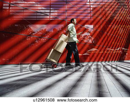 A courier delivers parcels View Large Photo Image Stock Photo - A courier delivers parcels. Fotosearch