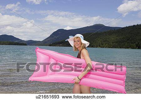 A girl smiling towards camera View Large Photo Image Stock Image - A girl smiling towards camera. Fotosearch