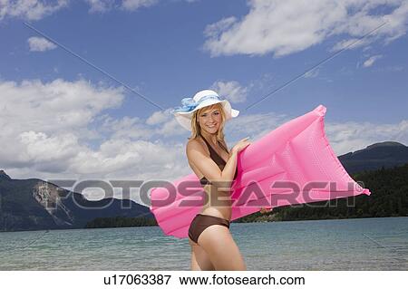 A girl smiling towards camera View Large Photo Image Stock Photo - A girl smiling towards camera. Fotosearch