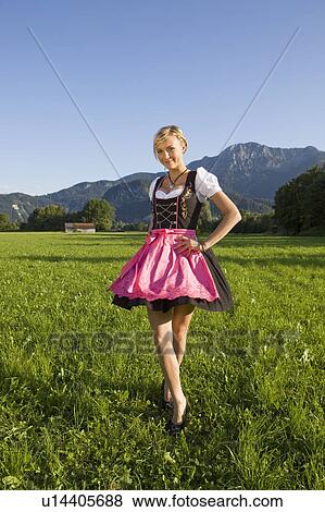 Stock Photo - A girl wearing a traditional outfit. Fotosearch