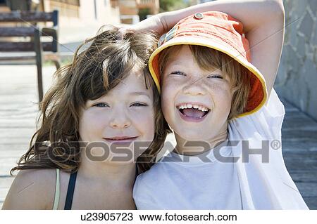 A portrait of a boy and girl View Large Photo Image Stock Image - A portrait of a boy and girl. Fotosearch