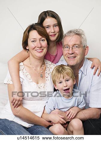 A portrait of a family View Large Photo Image Stock Photography - A portrait of a family. Fotosearch