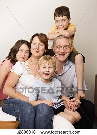 A portrait of a family with 3 kids View Large Photo Image Stock Image - A portrait of a family with 3 kids. Fotosearch