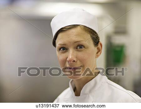 Stock Photo - A portrait of a female chef. Fotosearch