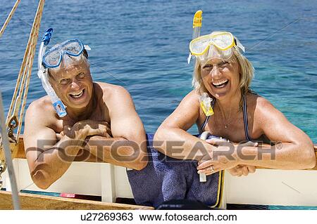 A senior couple with snorkels View Large Photo Image Stock Image - A senior couple with snorkels. Fotosearch