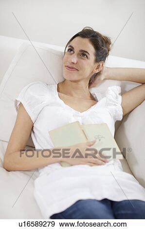 a woman daydreaming View Large Photo Image Stock Photo - a woman daydreaming. Fotosearch