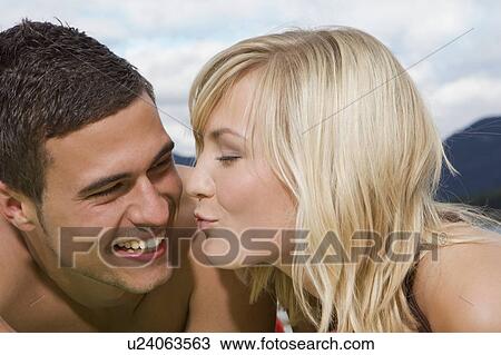 A young couple having fun View Large Photo Image Stock Image - A young couple having fun. Fotosearch