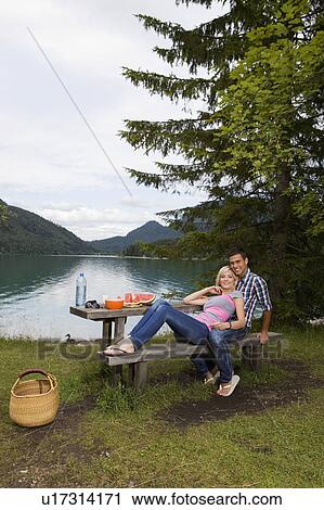 Stock Image - A young couple smiling. Fotosearch