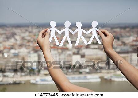 Arms cut-out paper people View Large Photo Image Stock Photography - Arms cut-out paper people. Fotosearch