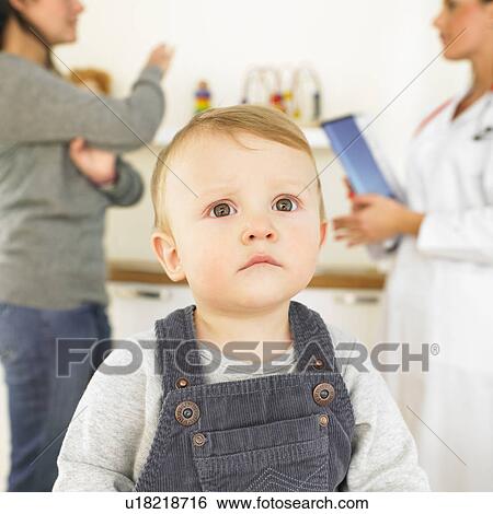 Stock Photograph - Baby at doctors office. Fotosearch
