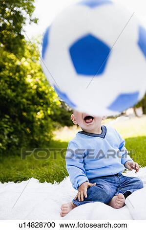 baby boy with football View Large Photo Image Stock Image - baby boy with football. Fotosearch