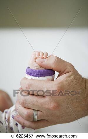 baby hand with father hand View Large Photo Image Stock Photo - baby hand with father hand. Fotosearch