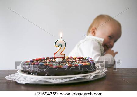 baby laughing with birthday cake View Large Photo Image Stock Photo - baby laughing with birthday cake. Fotosearch