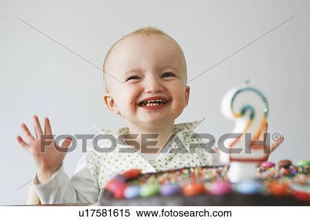 baby laughing with birthday cake View Large Photo Image Stock Photography - baby laughing with birthday cake. Fotosearch