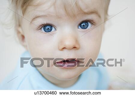 Stock Image - baby looking at viewer. Fotosearch