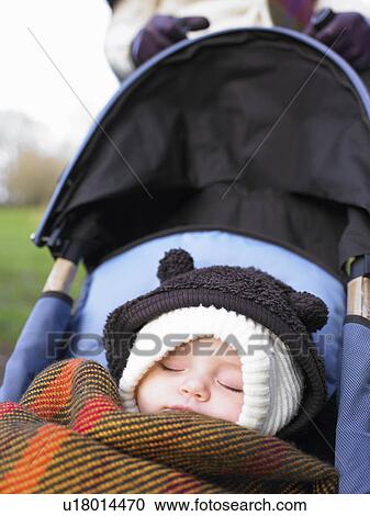 baby sleeping in pram View Large Photo Image Stock Image - baby sleeping in pram. Fotosearch