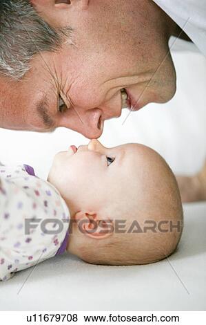 baby with father View Large Photo Image Stock Photo - baby with father. Fotosearch