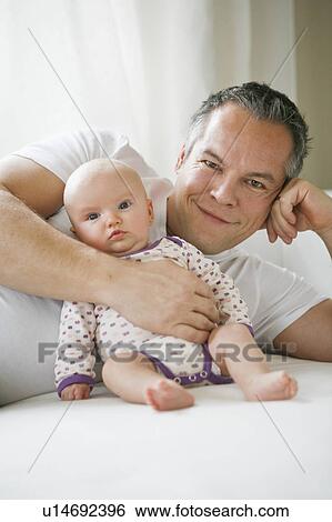 Stock Photograph - baby with father. Fotosearch