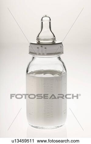 Stock Image - Baby's bottle with milk. Fotosearch
